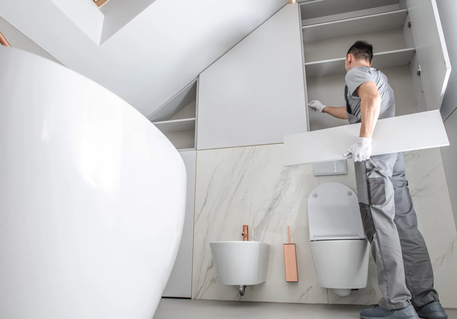 Plumber fitting new bathroom units